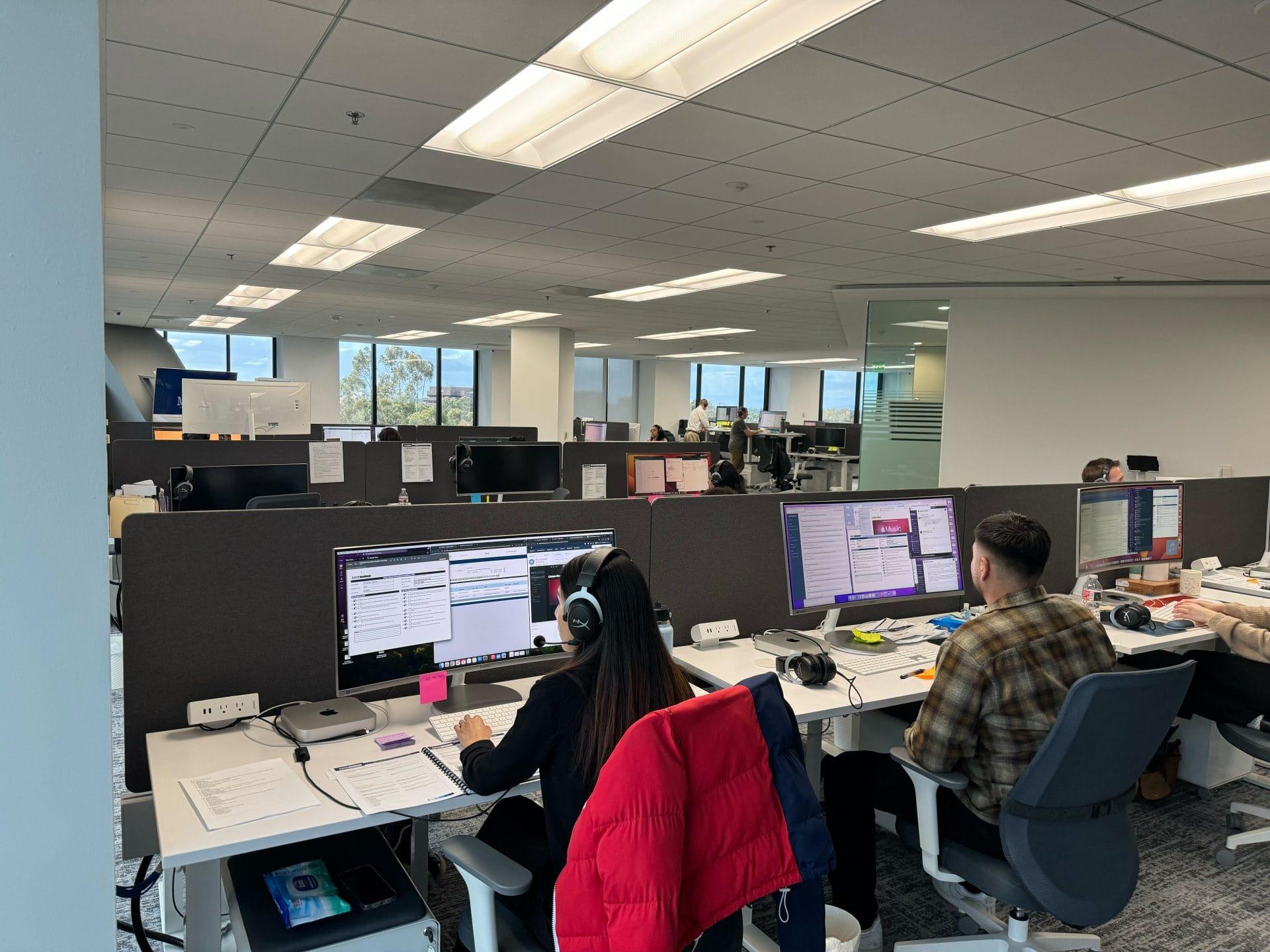 Mass Tort Strategies intake specialists working at their desks in the call center
