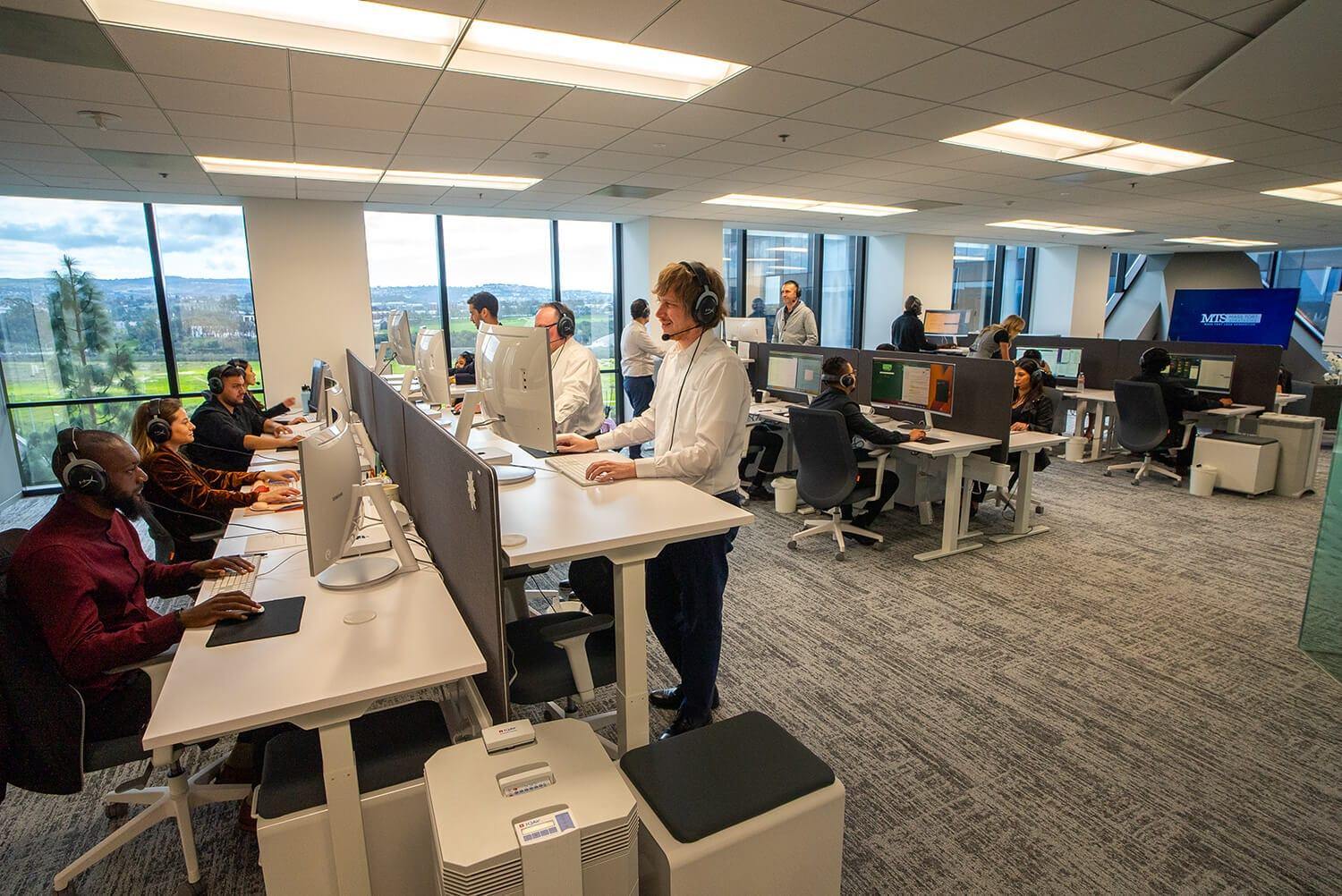 The Mass Tort Strategies intake floor with agents on calls